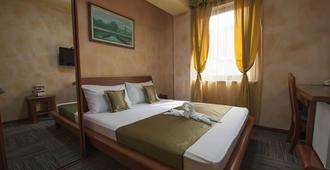 Hotel Kerber - פודגוריצה - חדר שינה
