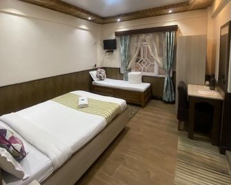 The Pinewood Hotel - Darjeeling - Ložnice