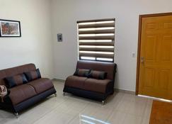 Cmg Suites - Acuña - Sala de estar