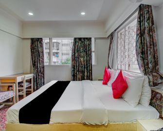 Capital O 76484 Hotel Balwas International - 孟買 - 臥室