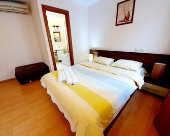 Grandville Apartments - Bucharest - Bedroom
