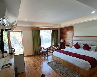 Resort The Himalayan Odyssey and Cottages - דרמאסאלה - חדר שינה