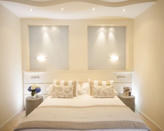 Hotel Mon Cheri - ריצ'ונה - חדר שינה