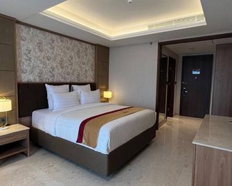 Grand Travello Hotel Bekasi - 芝卡朗 - 臥室