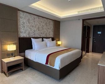 Grand Travello Hotel Bekasi - Cikarang - Bedroom