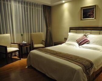 Greentree Inn Shantou Chengjiang Road Business Hotel - Shantou - Schlafzimmer