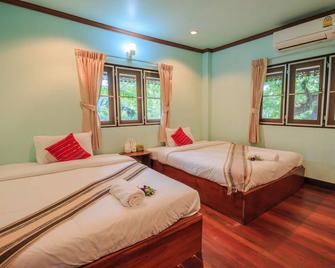 Mitkhoonyoum Hotel - Khun Yuam - Bedroom