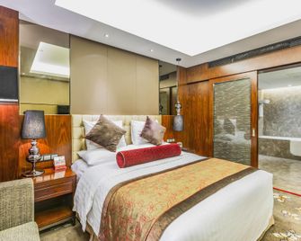Jitang New Century Hotel - Tangshan - Slaapkamer