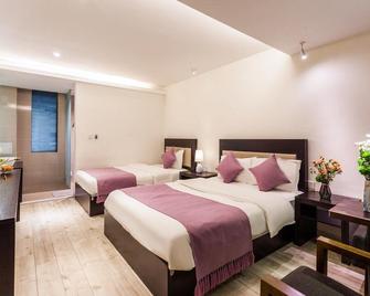 Pure Comfort Inn - Dali - Habitación