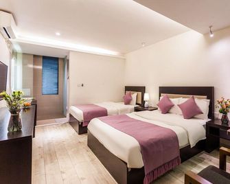 Pure Comfort Inn - Dali - Sypialnia