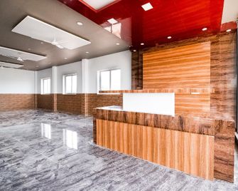 Super Hotel O by OYO New Rock - Shravanabelagola - Front desk