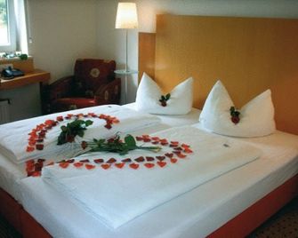 Pension Geno - Geisenhausen - Bedroom