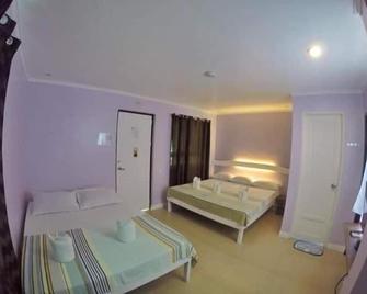Joaquinn's Bed and Breakfast - El Nido - Phòng ngủ
