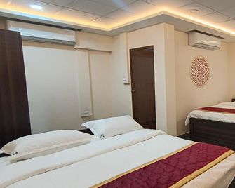 Shri Bhagawathi Residency - Palani - Bedroom
