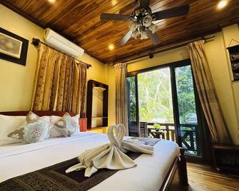 Anisa Mekong Riverside Villa - Luang Prabang - Schlafzimmer