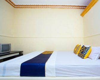 Hotel O Buana Jaya Guest House - Cilacap - Bedroom