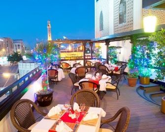 Arabian Courtyard Hotel & Spa - דובאי - מסעדה