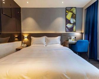 7 Premium Hotel (Jiaozuo railway station & Jianshe Road) - Jiaozuo - Slaapkamer