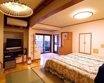 Masutomi Ryokan - Hakone - Yatak Odası