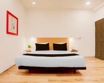 OYO 78603 Townhouse Hotel Woodland - Nagpur - Slaapkamer
