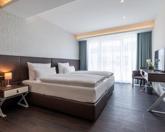 Trip Inn Conference Hotel & Suites - Wetzlar - Schlafzimmer