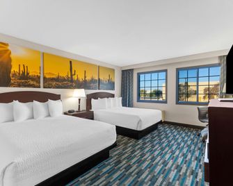دايز إن آند سويتس باي ويندام ميسا نير فينيكس - ميسا - غرفة نوم