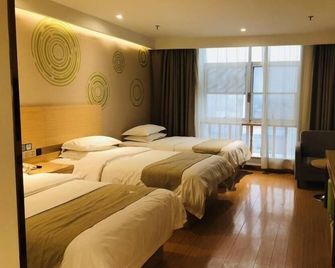 Greentree Inn Heze Danxian Shangmaocheng Business Branch - Heze - Спальня
