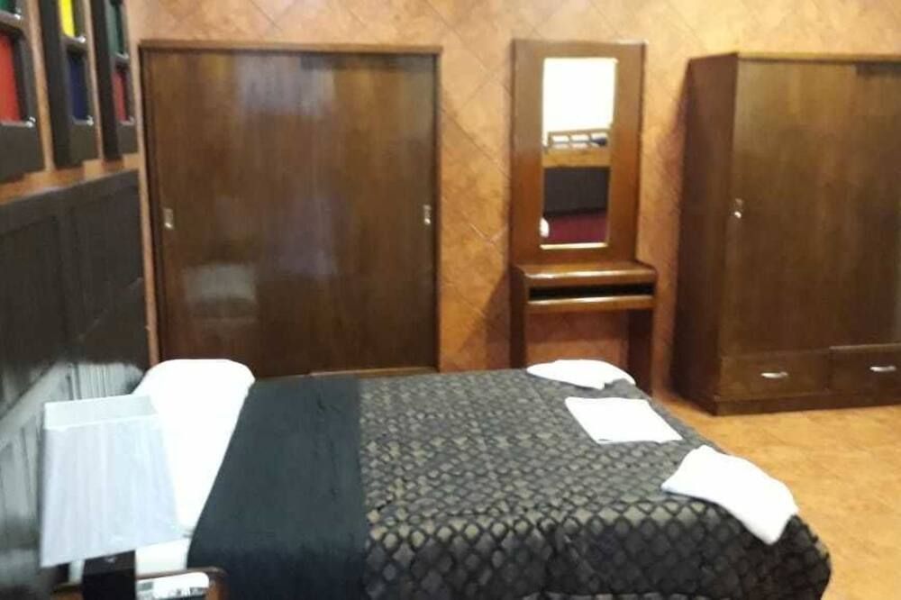 هوستال ريسيدينثيال ليونيس دي كاستييا - اسونسون - غرفة نوم