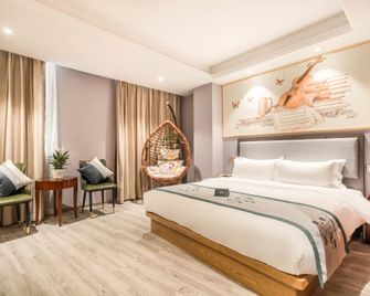 Xingdao Holiday Hotel (Shanghai wusong international Cruise Terminal) - شنغهاي - غرفة نوم