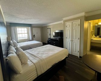 Travelodge by Wyndham Tuscaloosa - Tuscaloosa - Schlafzimmer