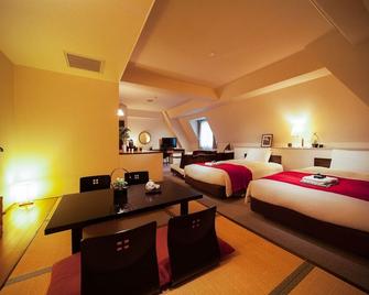 Hakuba Springs Hotel - Hakuba - Bedroom
