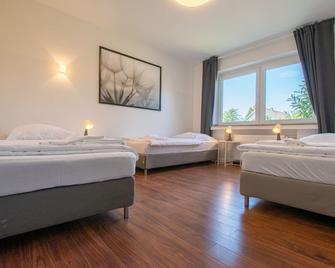 Tolstov-Hotels Great House - Meerbusch - Schlafzimmer
