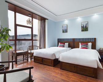 Zhangjiajie Debao Boutique Hotel - Zhangjiajie - Bedroom