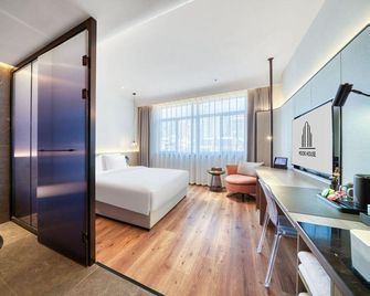 Taizhou Moke Hotel (Taizhou Sports Center) - Taizhou - Habitación