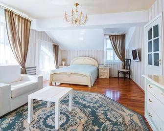 Boutique Hotel Redhouse - יארוסלאבל - חדר שינה