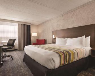 Country Inn & Suites by Radisson, Mt Pleasant - Sturtevant - Schlafzimmer