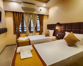 Hotel Venkatesh Regency - Siliguri - Bedroom