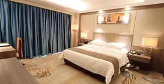 Centenio Kingdom Hotel - Foshan - Sypialnia