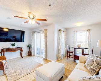 Gulf view condo with central AC, WiFi, washer/dryer, & pool - walk to beach - Navarre Beach - Living room