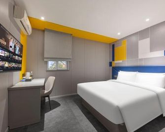 7 Days Inn Shenzhen University Xuefu Road Branch - שנג'ן - חדר שינה