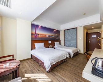 Luyue Hotel - גואנגג'ואו - חדר שינה