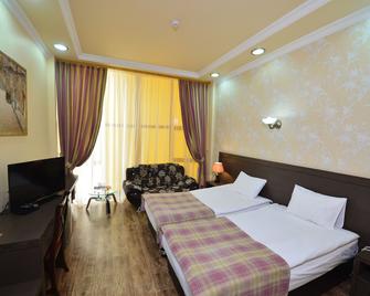 Yerevan Deluxe Hotel - Jerevan - Makuuhuone