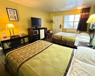 Relax Inn - Hampton - Bedroom