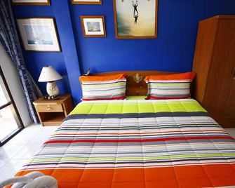 Summer Breeze Inn - Wichit - Schlafzimmer