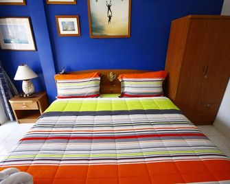 Summer Breeze Inn - Wichit - חדר שינה