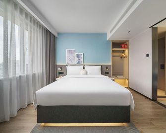 Country Inn & Suites by Radisson, Urumqi Youhao Hetan Road Hotel - Ürümqi - Soveværelse