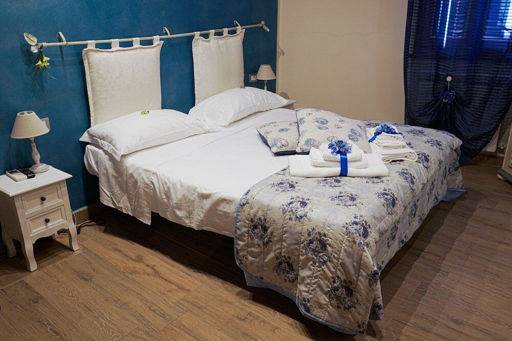 B&B Le Undici Lune - סן ג'ימיניאנו - חדר שינה