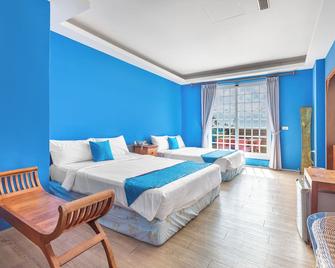 Golden Ocean Azure Hotel - Hengchun Township - Спальня