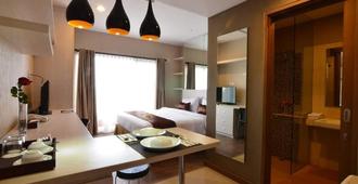 Student Park Hotel - Yogyakarta - Schlafzimmer