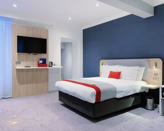 Holiday Inn Express London - Victoria By IHG - לונדון - חדר שינה